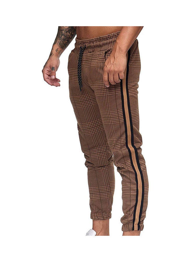 Men Casual Pocket Stripe Plaid Print Drawstring Long Ankle Tied Trousers Light Khaki