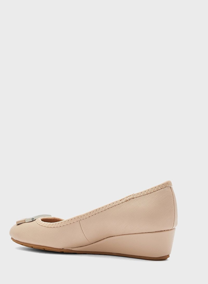 Low Heel Wedge Pumps