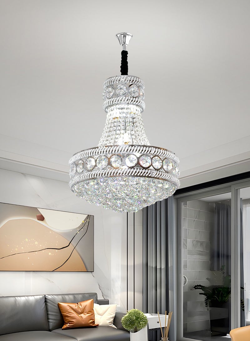 The LED Crystal Chandelier is a modern silver crystal chandelier with adjustable light and height, perfect for various settings such as living rooms, restaurants, and bedrooms.