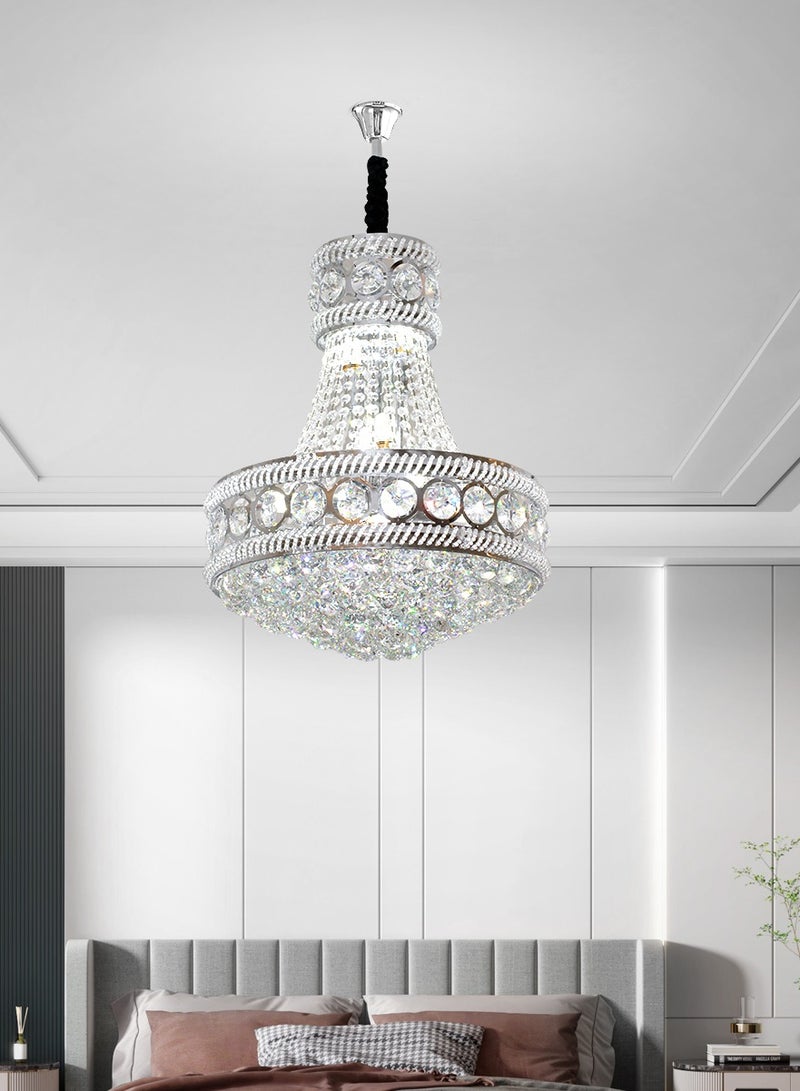 The LED Crystal Chandelier is a modern silver crystal chandelier with adjustable light and height, perfect for various settings such as living rooms, restaurants, and bedrooms.