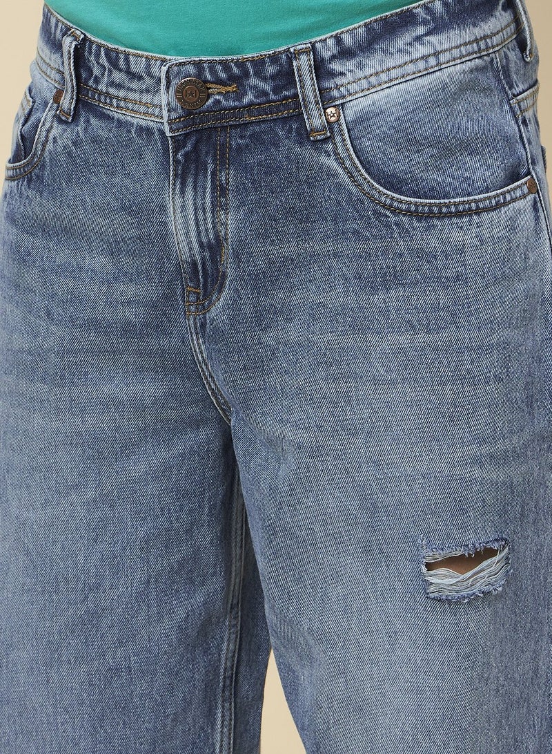 Loose Fit Mid Blue Jeans for Men with Mild Distressing