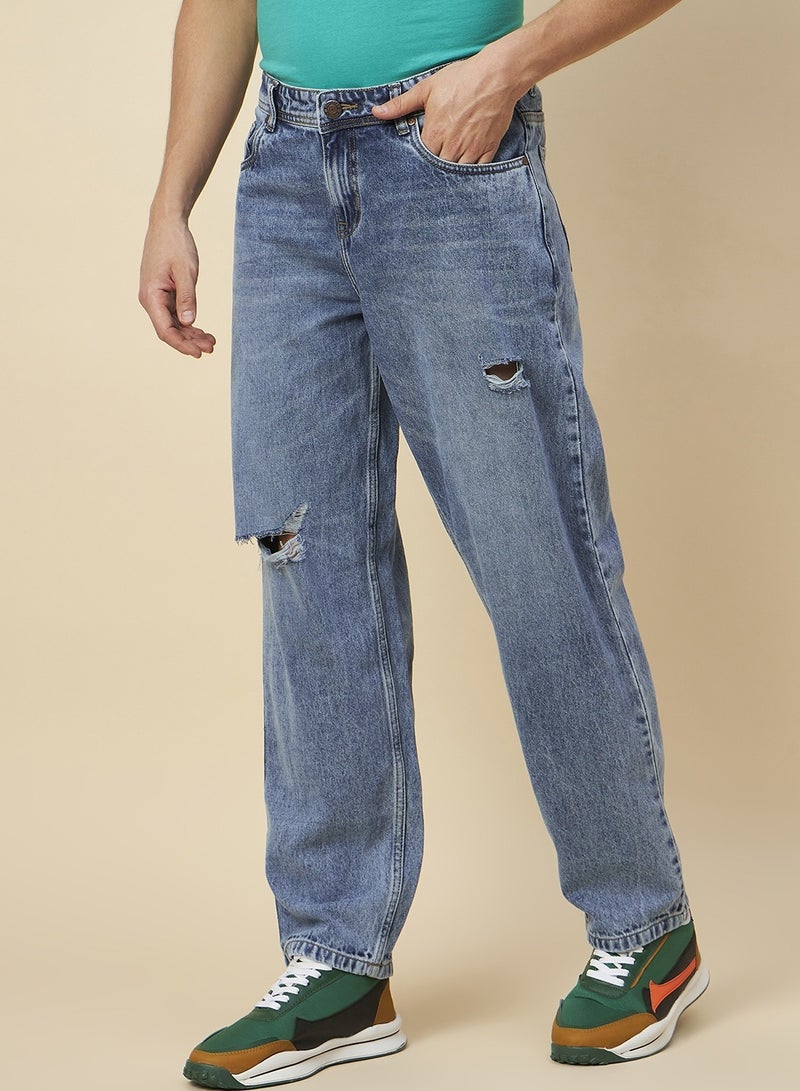 Loose Fit Mid Blue Jeans for Men with Mild Distressing