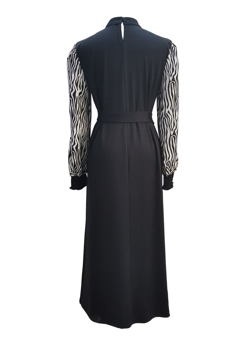 Elegant Middle Eastern-Inspired Black Dress with Black and White Striped Sleeves - Perfect for Professional Women