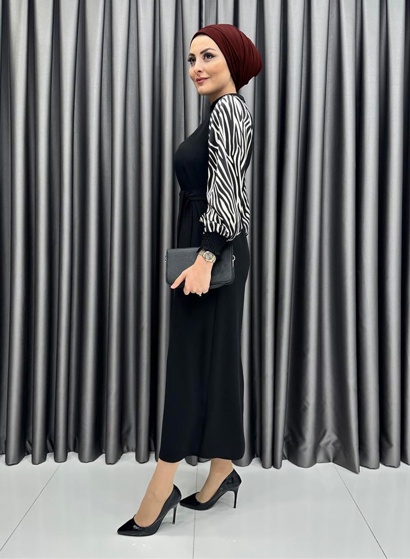 Elegant Middle Eastern-Inspired Black Dress with Black and White Striped Sleeves - Perfect for Professional Women