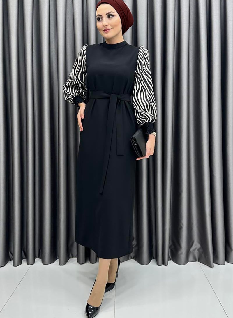 Elegant Middle Eastern-Inspired Black Dress with Black and White Striped Sleeves - Perfect for Professional Women