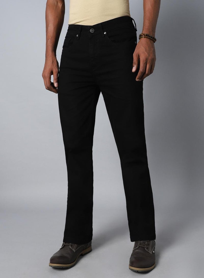 Relaxed Fit Black Mid-Rise Jeans for Men with Mildly Distressed Look