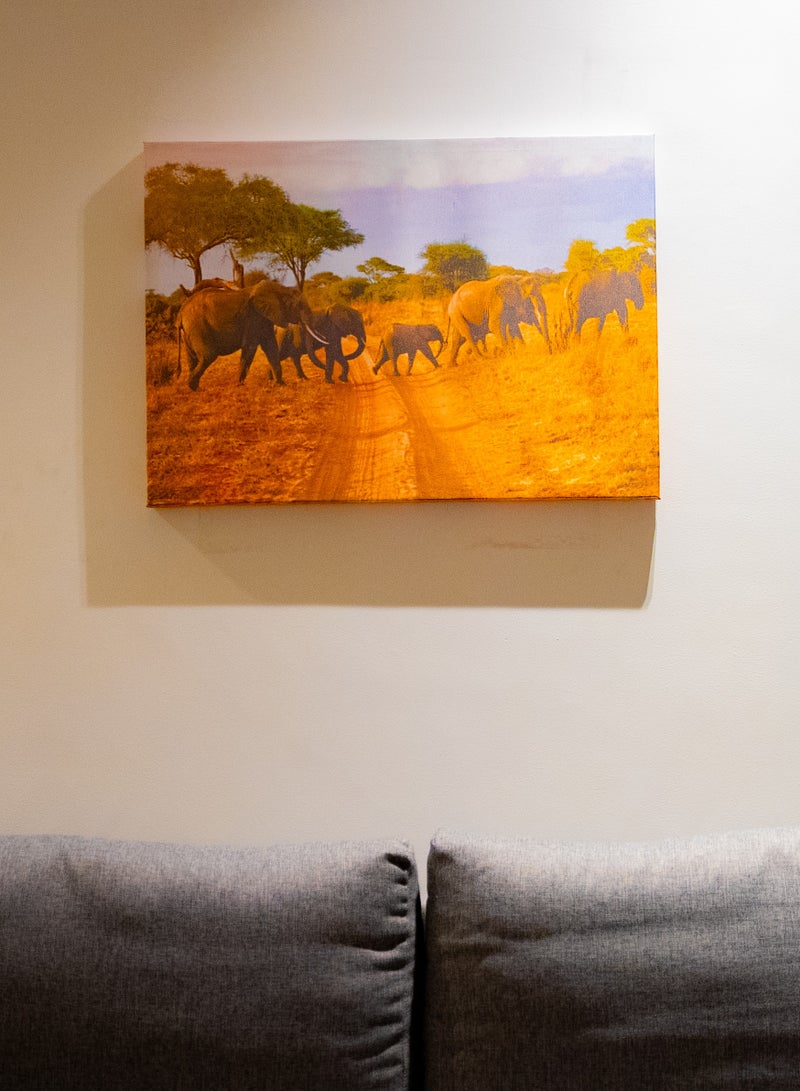 Elephants crossing the Savannah Canvas Wall Frame