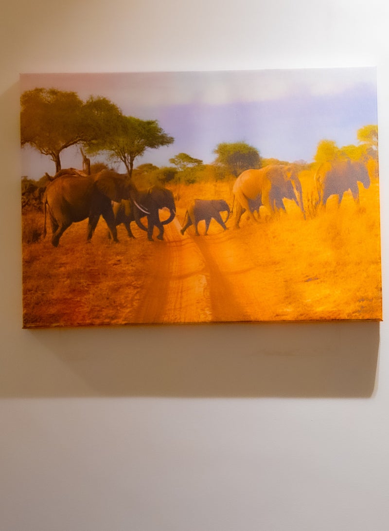 Elephants crossing the Savannah Canvas Wall Frame