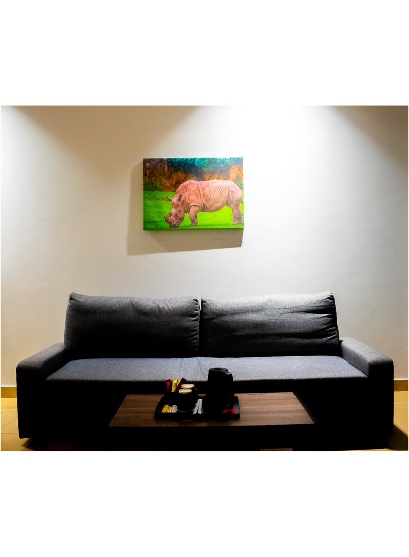 Rhinoceros in the Grasslands Canvas Wall Frame