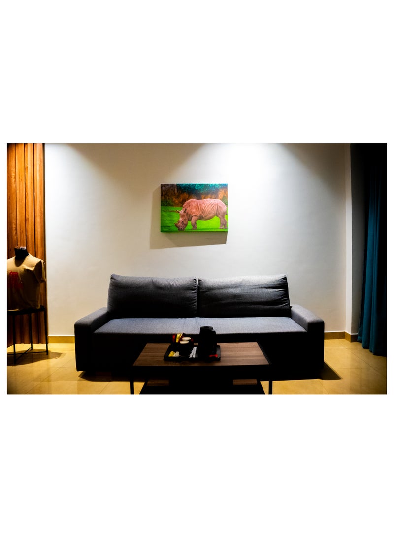 Rhinoceros in the Grasslands Canvas Wall Frame