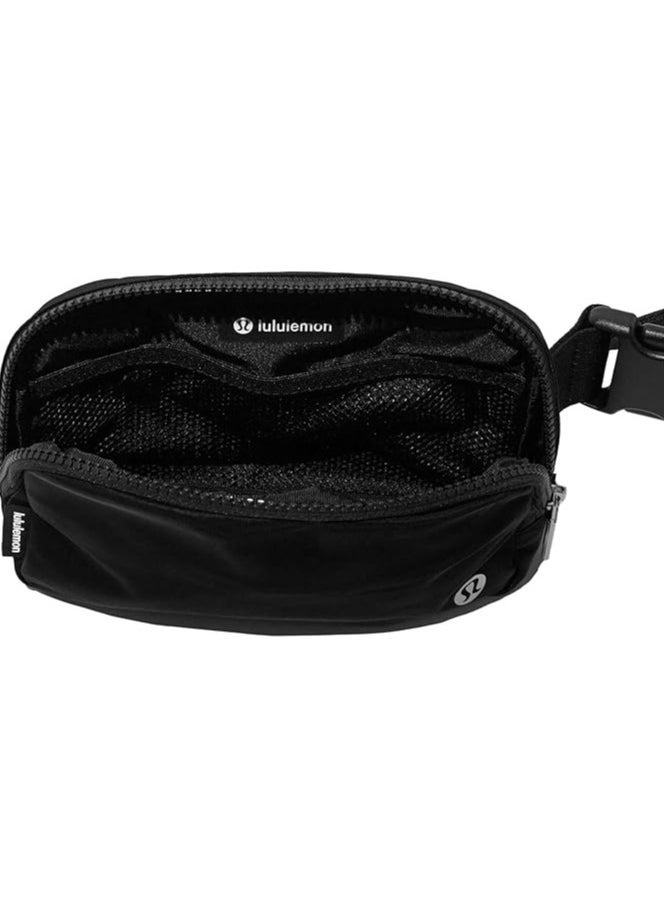 Everywhere Belt Bag, Compact, and Convenient Belly Bag with Zippered Pockets, Easy-Access Exterior Pocket, and Interior Essentials Pocket for On-the-Go Storage, Black