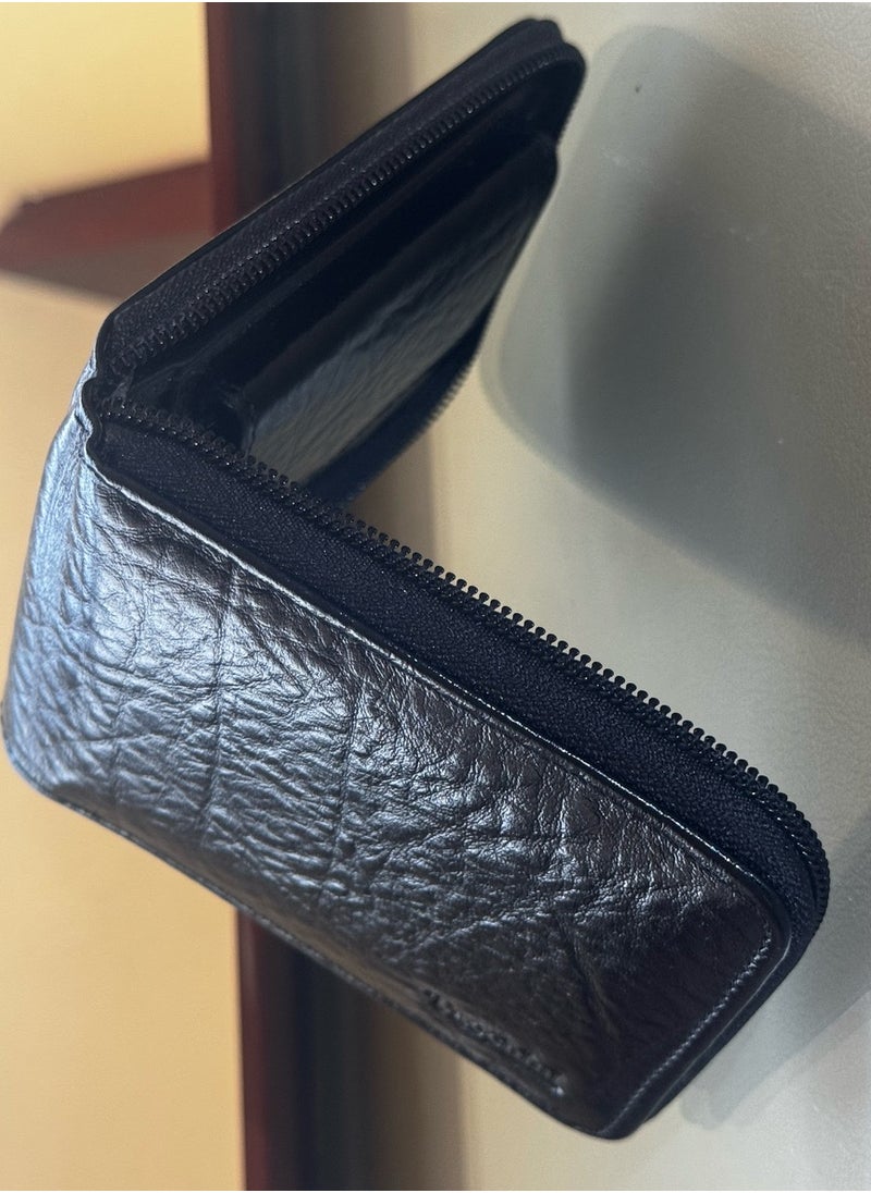 classic black leather wallet boasts a sleek and sophisticated look that never goes out of style.