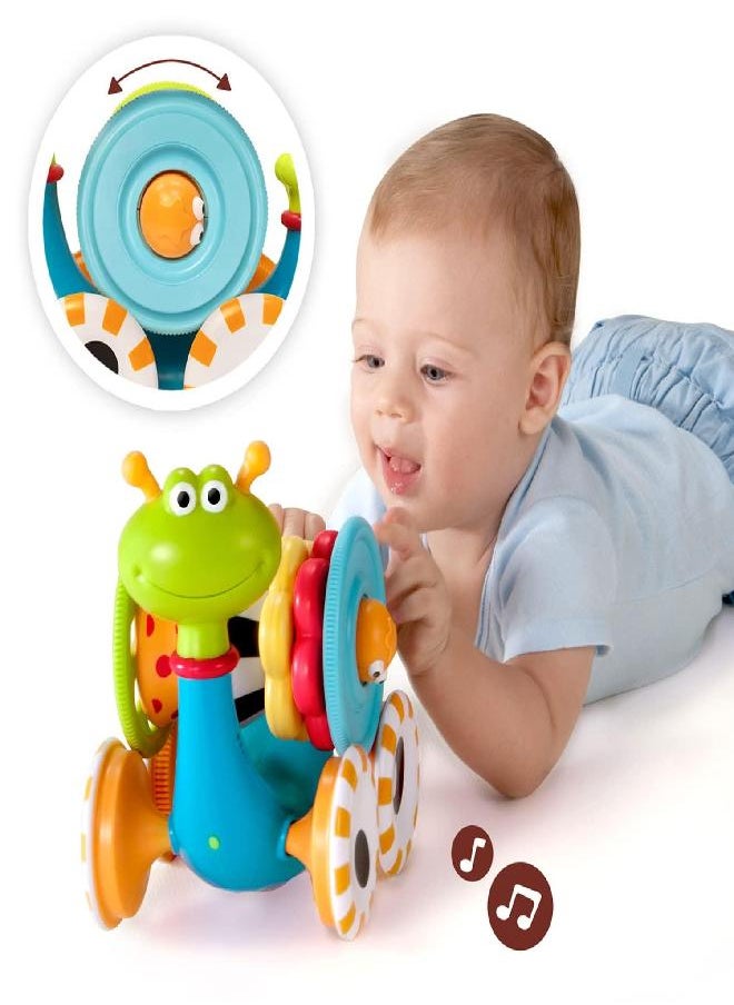 Yookidoo Musical Crawl 'N' Go Snail Toy with Stacker - Promotes Baby's Crawling and Walking. Rolls and Spins Its Shell As It Moves.