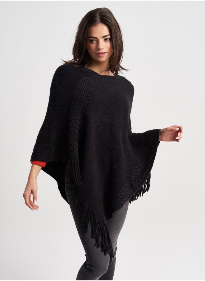 Chic Black Knitted Poncho with Fringes - Modern and Versatile