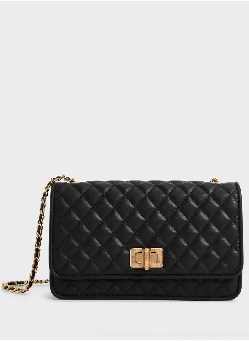 Charles & Keith Metallic Turn-Lock Quilted Clutch