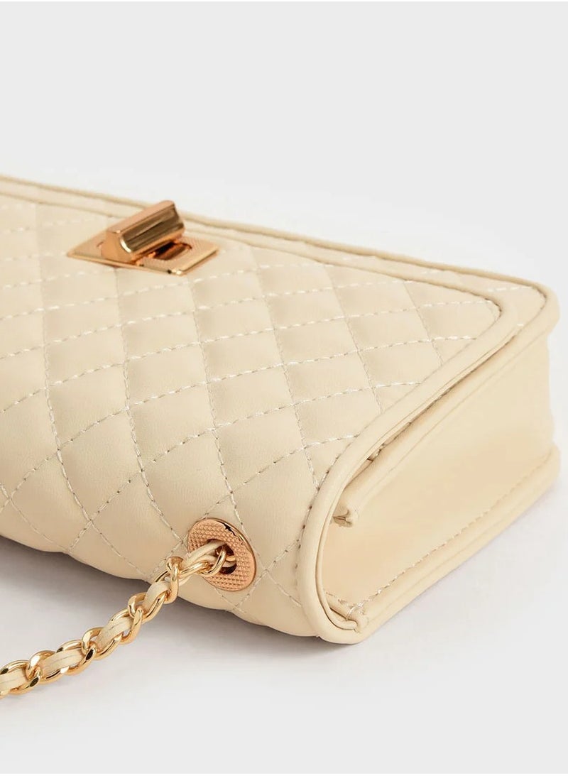 Charles & Keith Metallic Turn-Lock Quilted Clutch