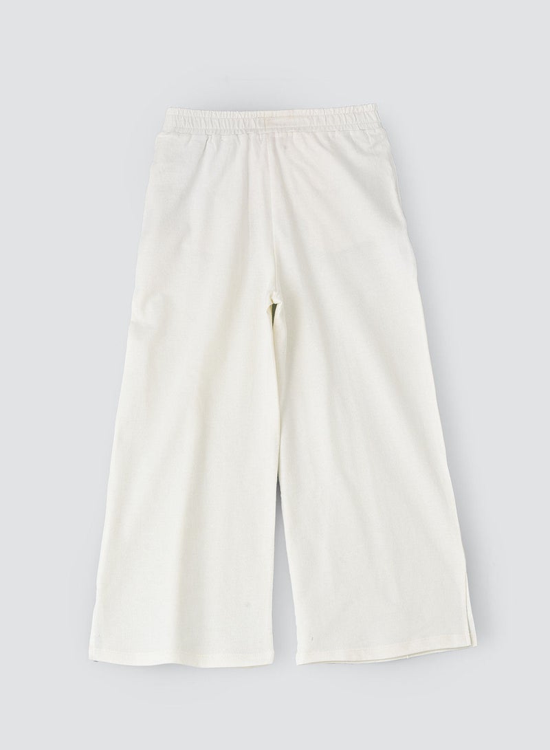 Solid knit pant with cut at bottom