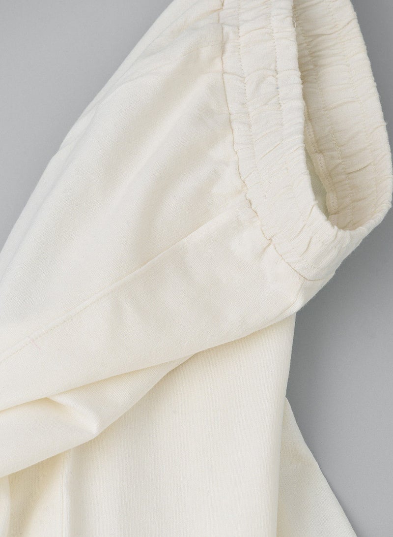 Solid knit pant with cut at bottom