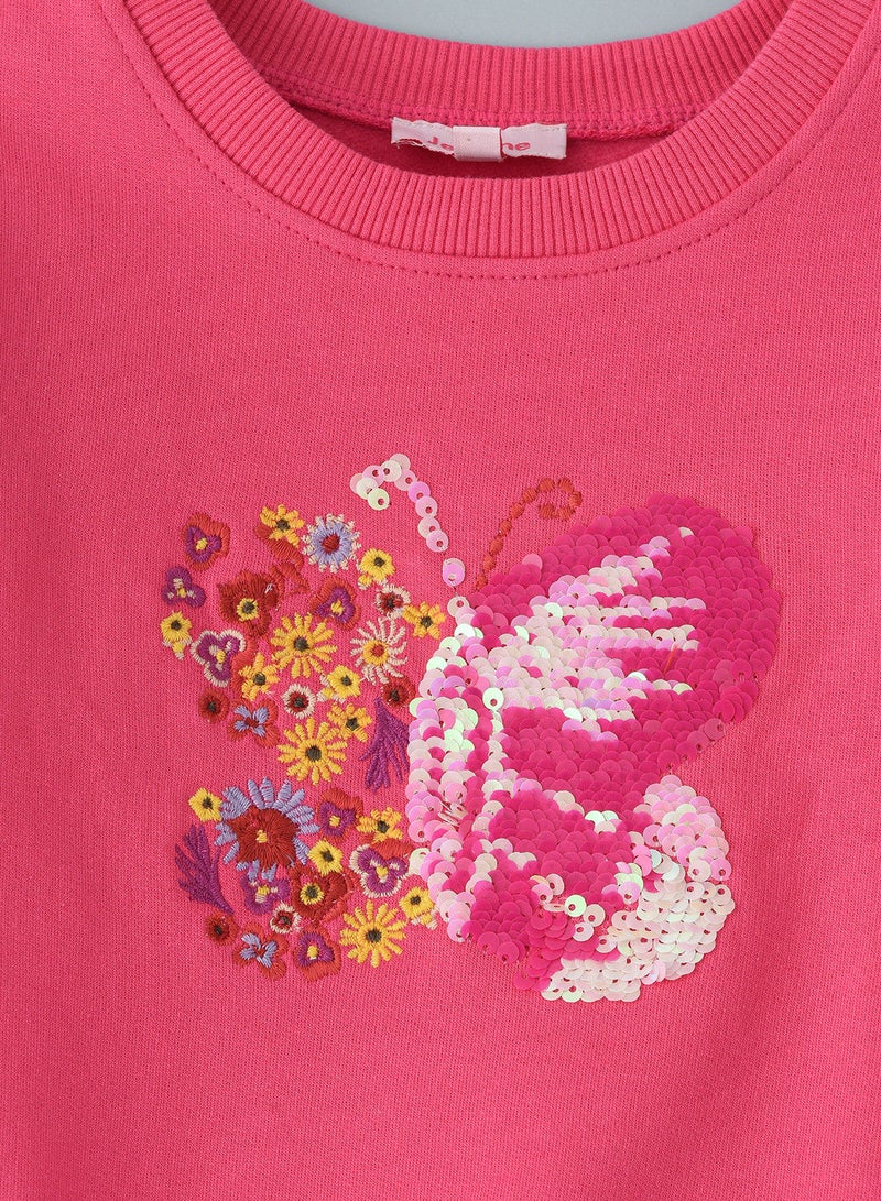 Sweat top with sequins work at front