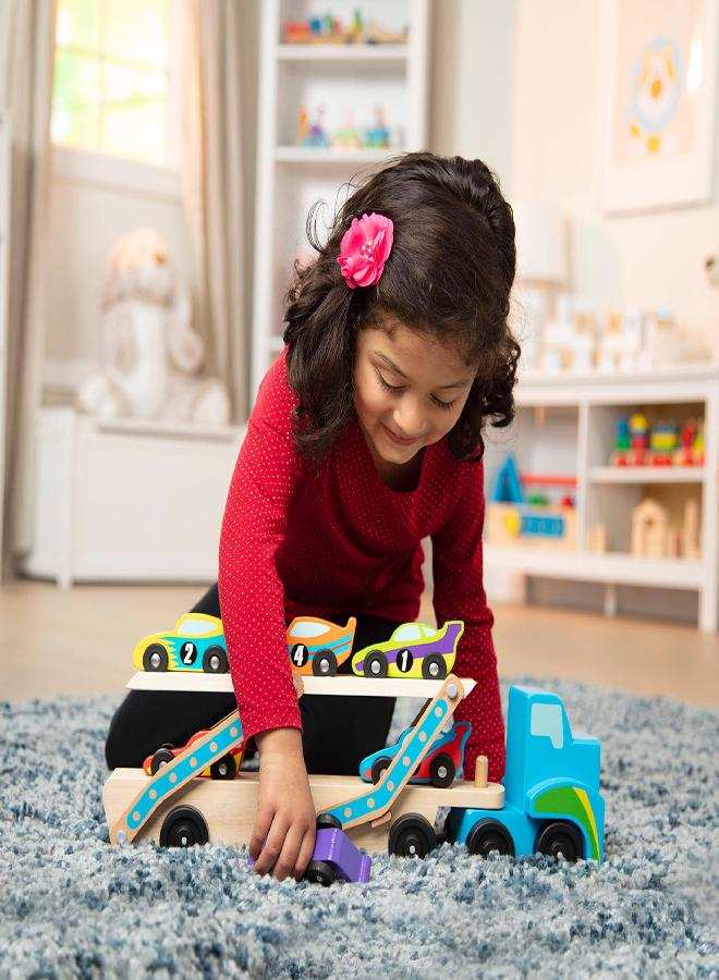 Melissa & Doug Mega Race-Car Carrier - Wooden Tractor and Trailer With 6 Unique Race Cars