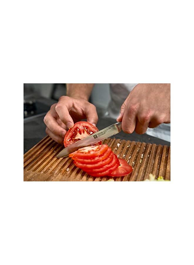 Four Star Utility Knife 13cm. Ergonomic handle. Forged Special Formula High-Carbon stainless steel. Ice-hardened. Precision-honed. 57 Rockwell Hardness. 15 degrees edge angle. Made in Germany