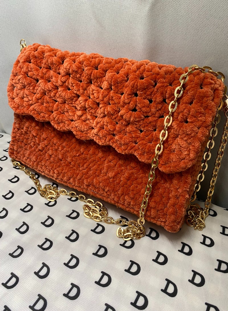 Pinata Orange classic vibrant Sling bag with Gold shoulder Chain