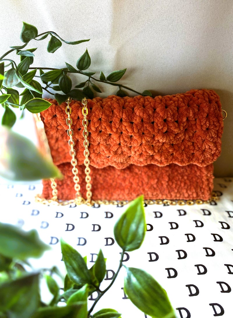 Pinata Orange classic vibrant Sling bag with Gold shoulder Chain