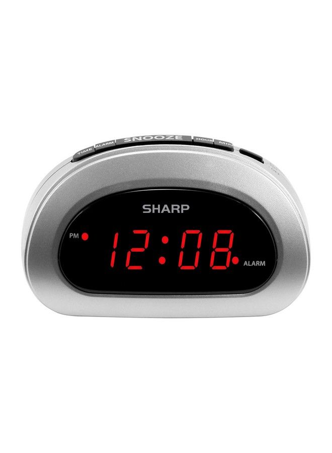 Small Digital Alarm Clock With Snooze And Battery Backup Easy To Use Top Button Controls For Simple Use Silver Case With Red Easy To Read Led Display