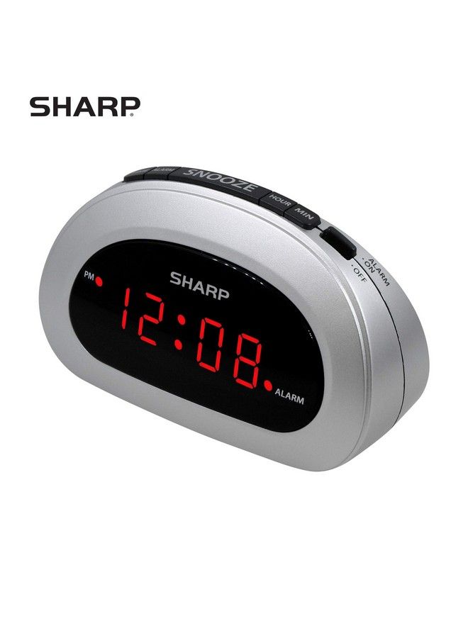 Small Digital Alarm Clock With Snooze And Battery Backup Easy To Use Top Button Controls For Simple Use Silver Case With Red Easy To Read Led Display