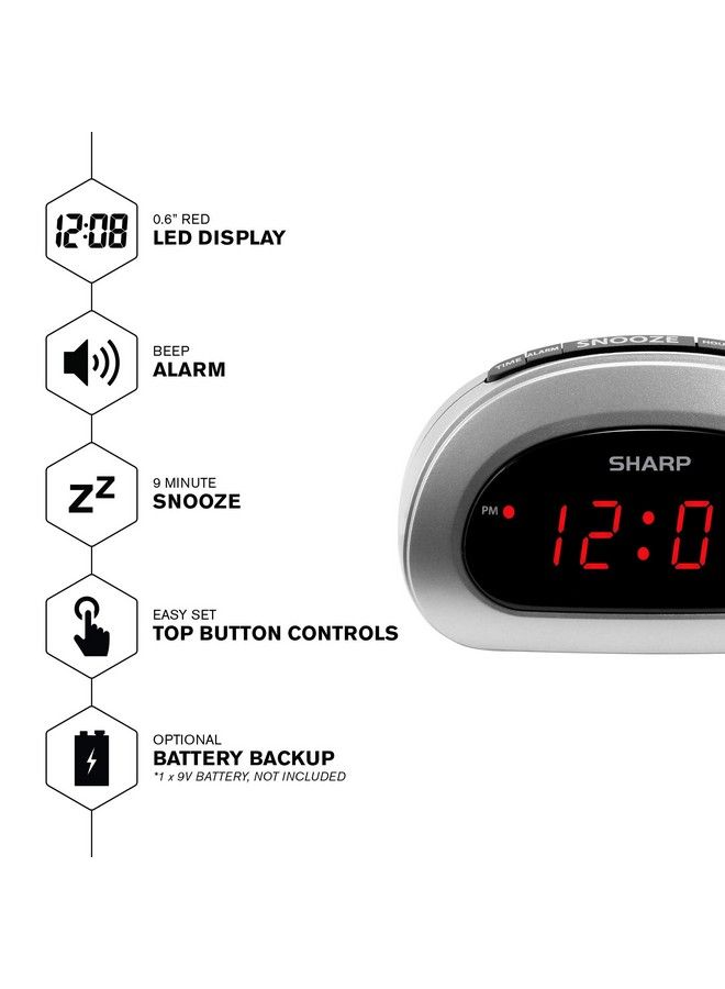 Small Digital Alarm Clock With Snooze And Battery Backup Easy To Use Top Button Controls For Simple Use Silver Case With Red Easy To Read Led Display