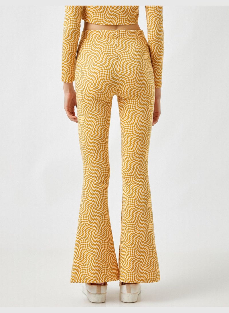 Patterned Slit Leg Flared Trousers