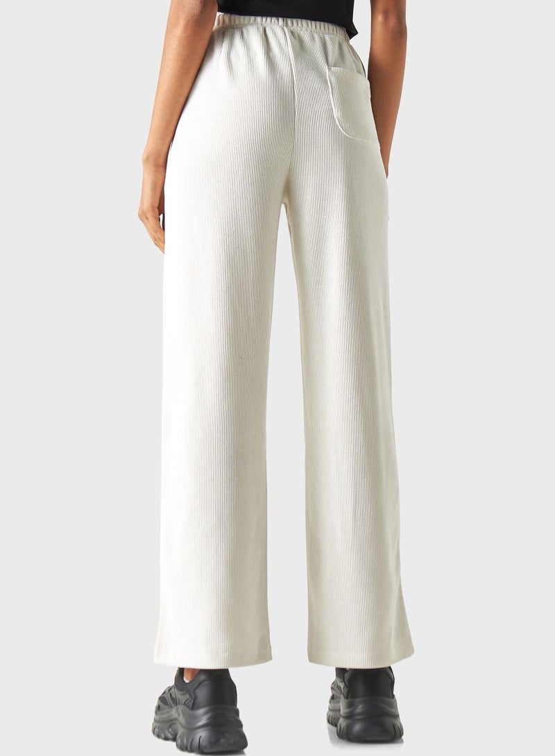 Embroidered Ribbed High Waist Pants