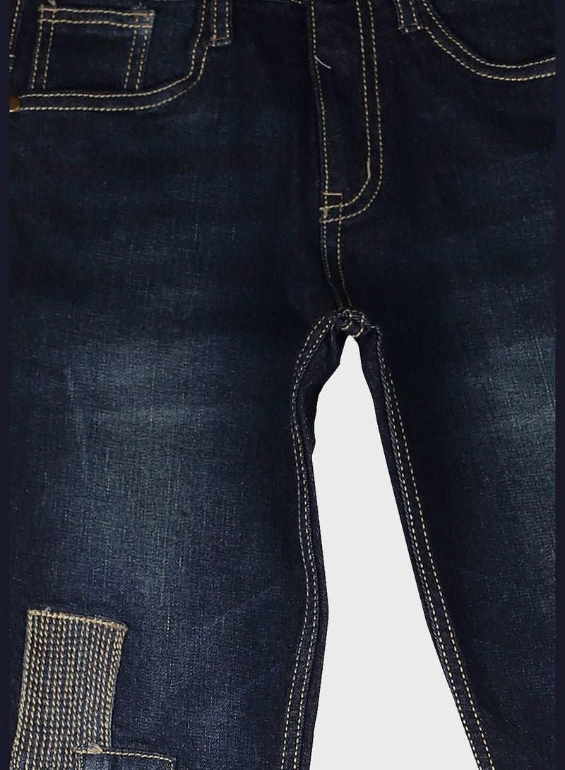 Distressed Slim Fit Jeans