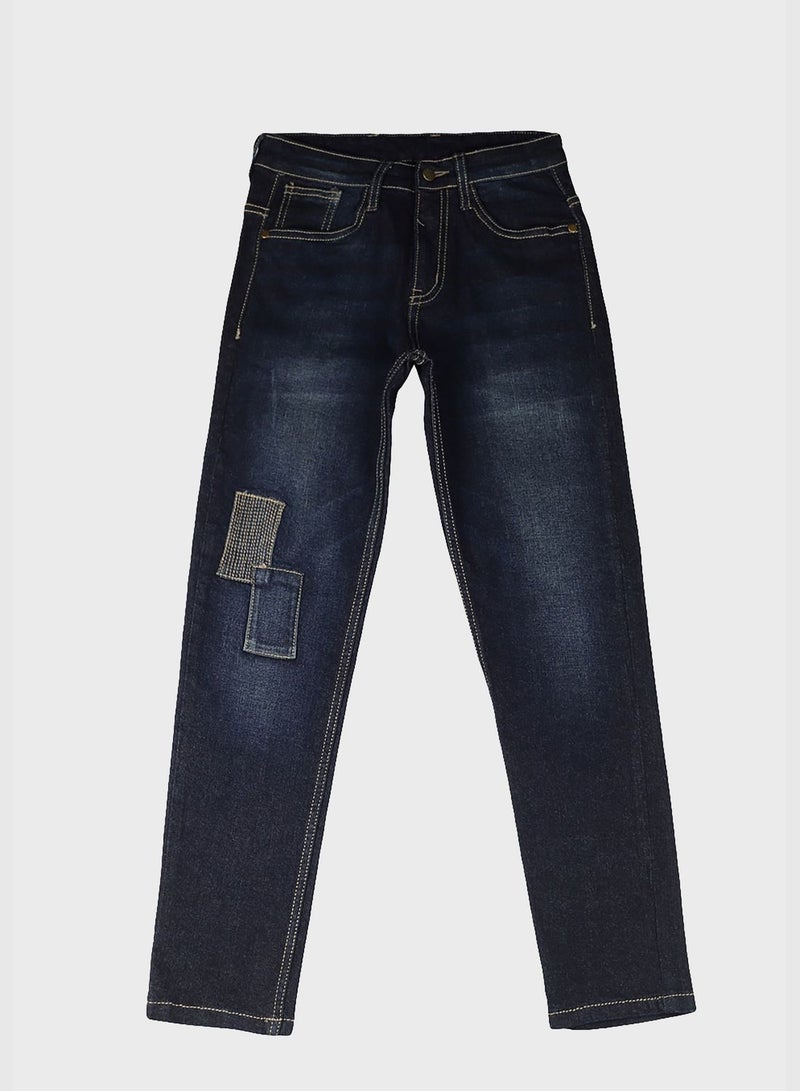 Distressed Slim Fit Jeans