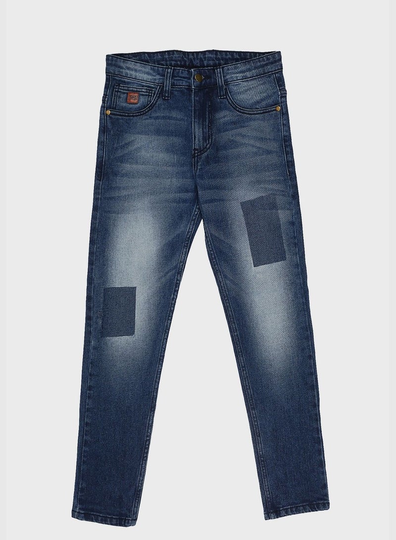 Distressed Slim Fit Jeans