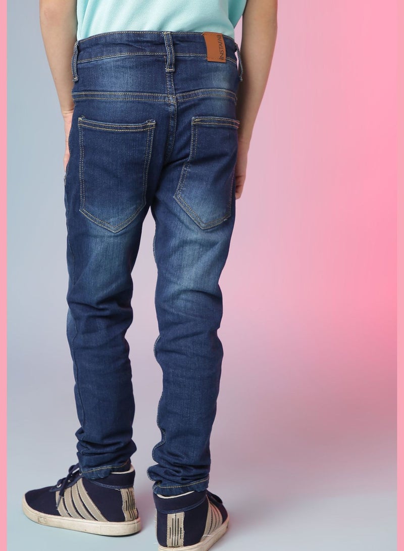 Distressed Slim Fit Jeans