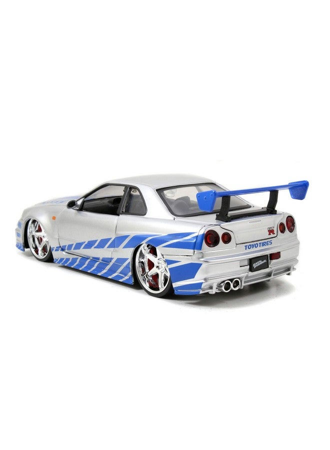 Jada Toys Fast & Furious Brian’S 2002 Nissan Skyline R34 Diecast Car 124 Scale Silver & Blue