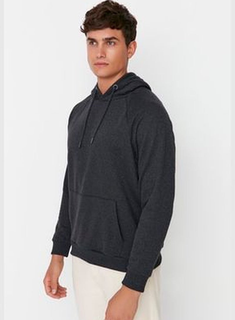 Black Men's Basic Regular/Regular fit with a hoodie. Raglan Fleece Polarized Sweatshirt TMNAW23SW00194.