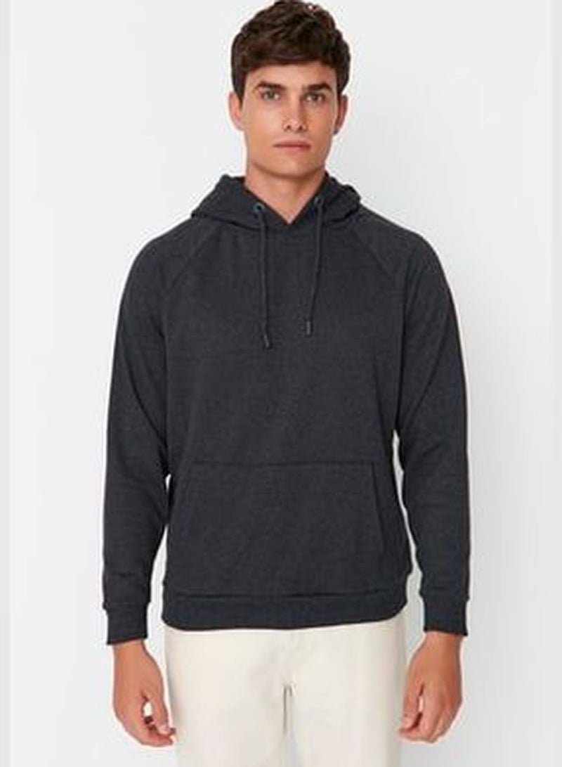 Black Men's Basic Regular/Regular fit with a hoodie. Raglan Fleece Polarized Sweatshirt TMNAW23SW00194.