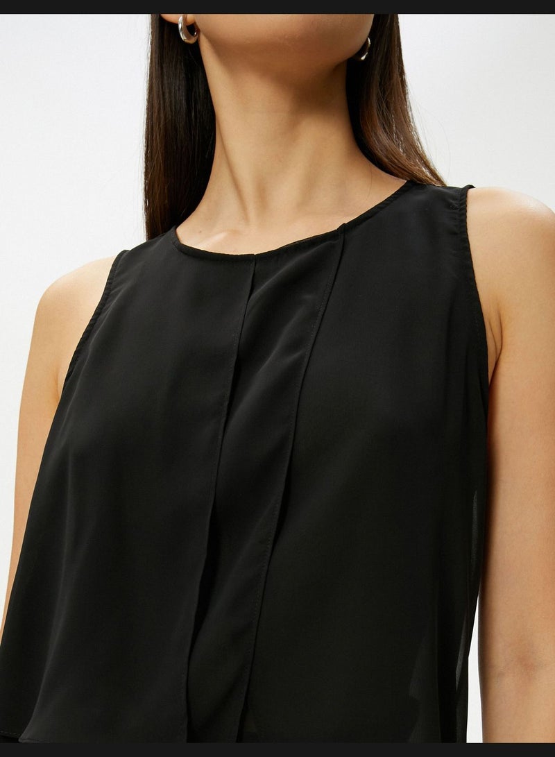 Asymmetric Cut Sleeveless Blouse