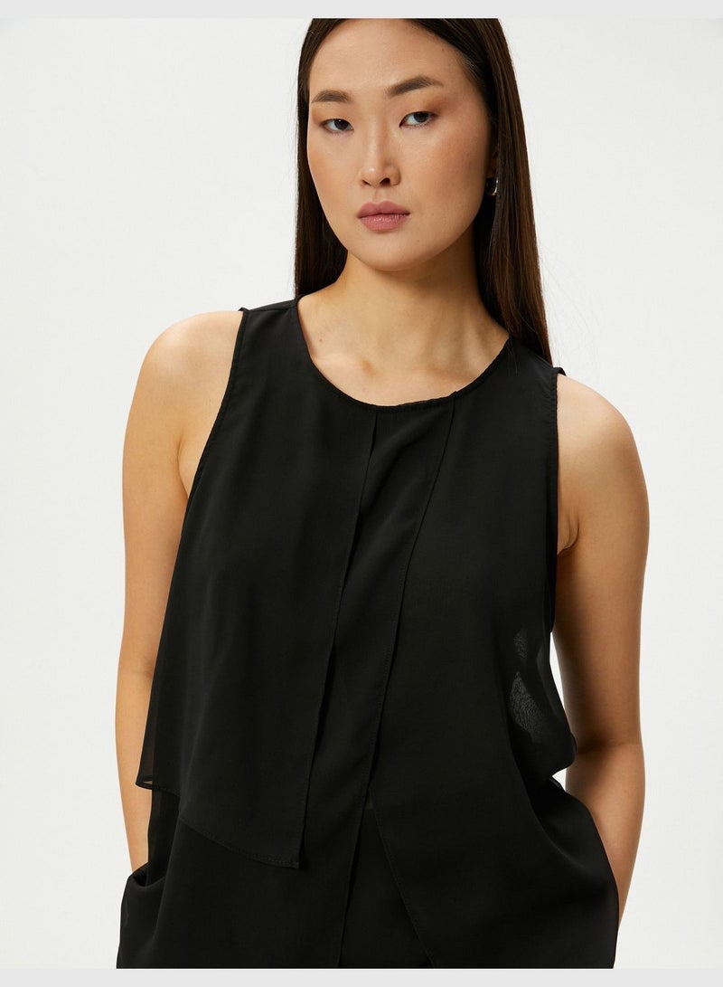 Asymmetric Cut Sleeveless Blouse