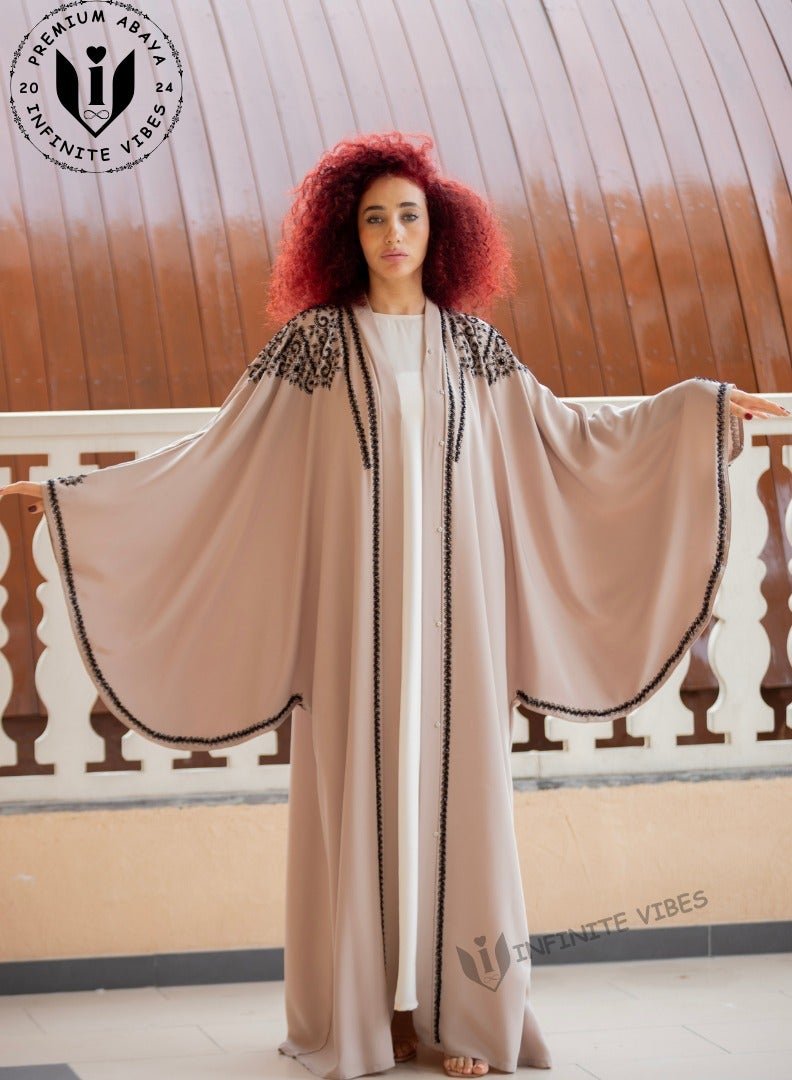 Exquisite Pink Nude Butterfly Abaya with Intricate Stone Embellishments - A Symbol of Elegance and Grace