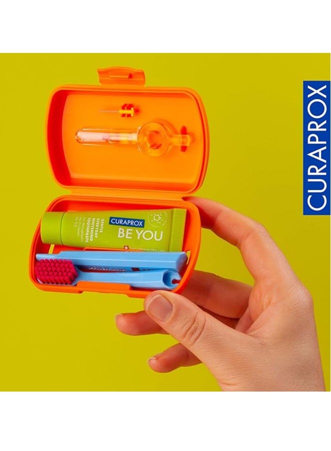 Curaprox Travel-Set Orange. Set includes Travel Toothbrush CS 5460, 10ml Be You Toothpaste, Interdental Brush CPS prime 07, CPS prime 09.