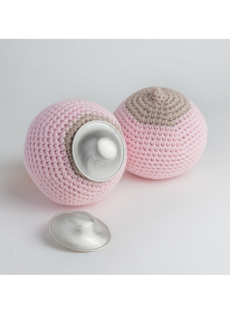 The Original Silver Nursing Cups, X