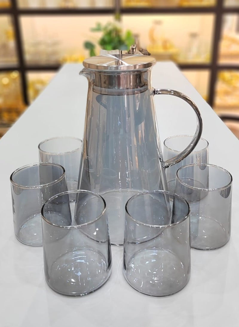 Stylish Glass Pitcher Set With Six Matching Tumblers Perfect For Serving Beverages Sleek Design With A Metal Lid And Handle Ideal For Modern Dining Setting