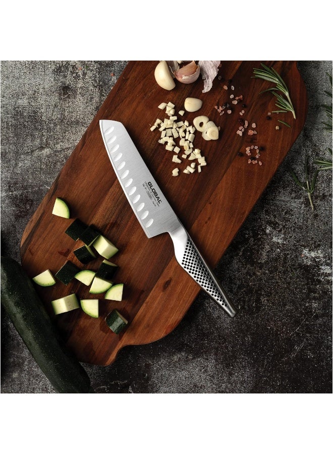 Fluted Vegetable Knife, 14cm. Stainless Steel. Ergonomic Dimpled handles ensures safe grip. Perfectly Balanced. Handcrafted in Japan.