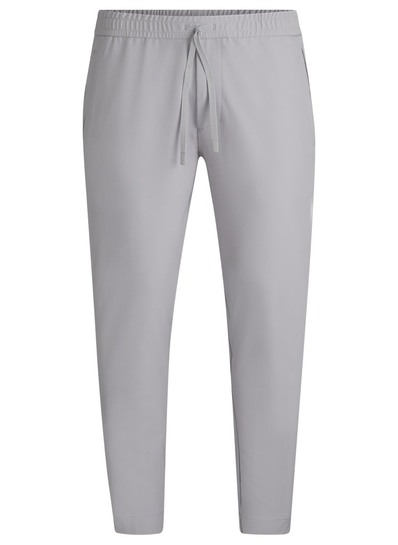 Tapered-fit trousers in water-repellent stretch fabric