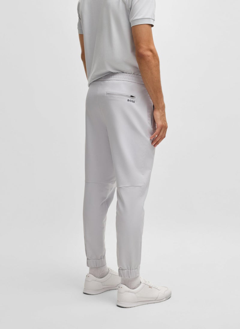 Tapered-fit trousers in water-repellent stretch fabric