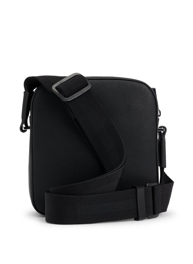 Grained faux-leather reporter bag with signature trims