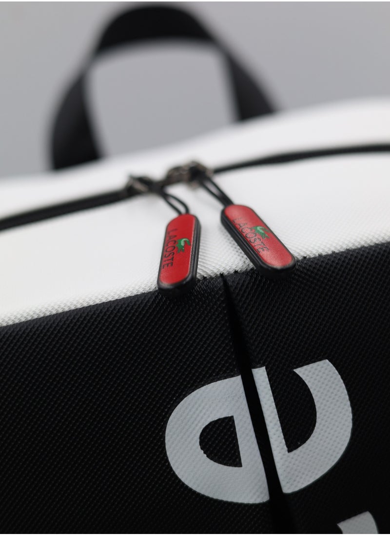 Lacoste Black and white color block backpack